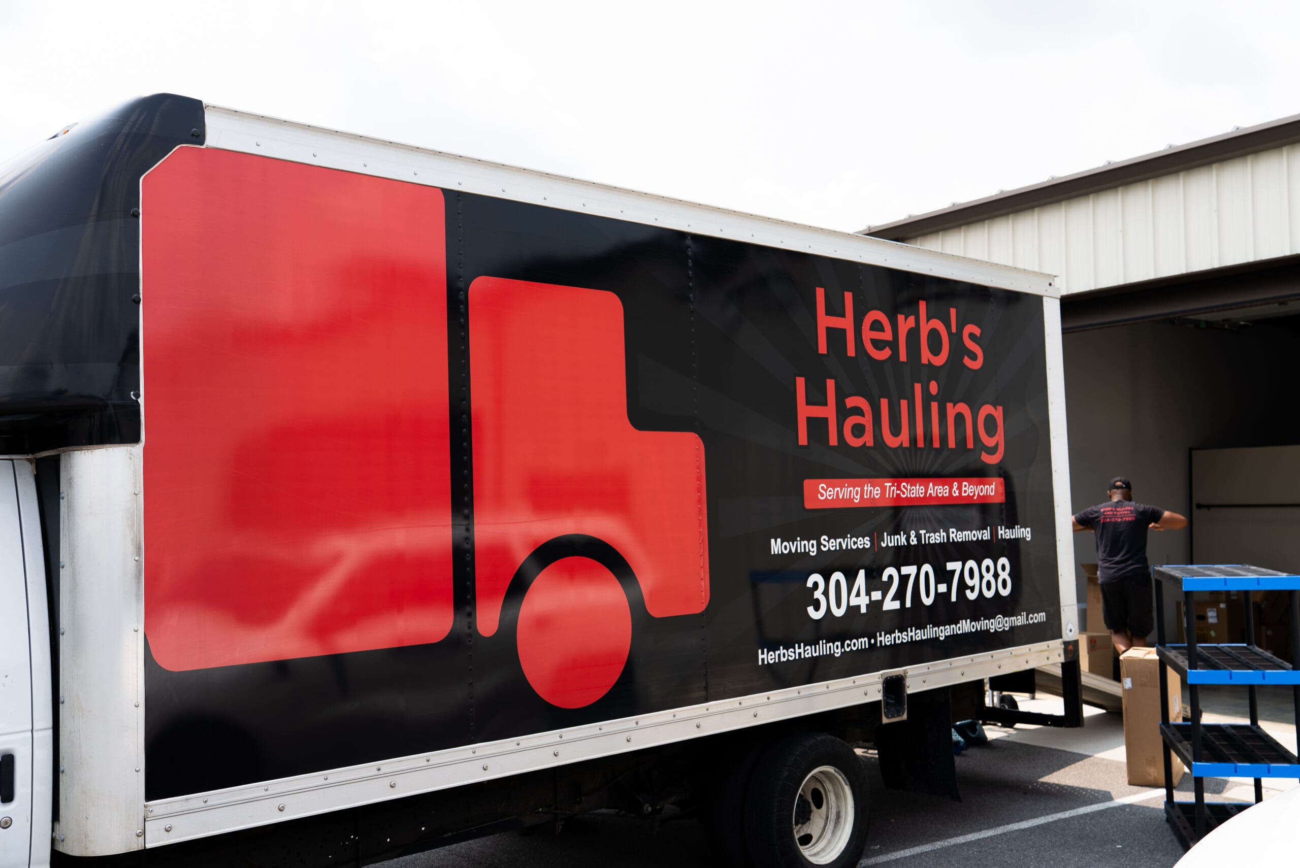 The Herb's Hauling branded moving truck